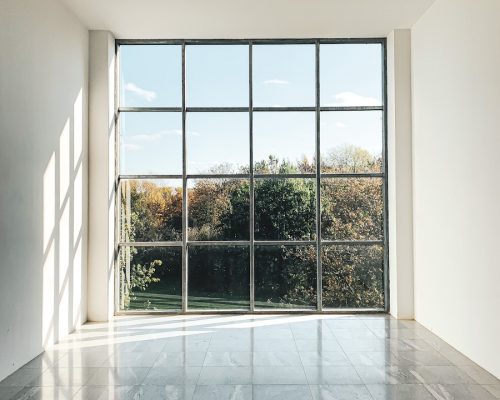 white framed glass window during daytime